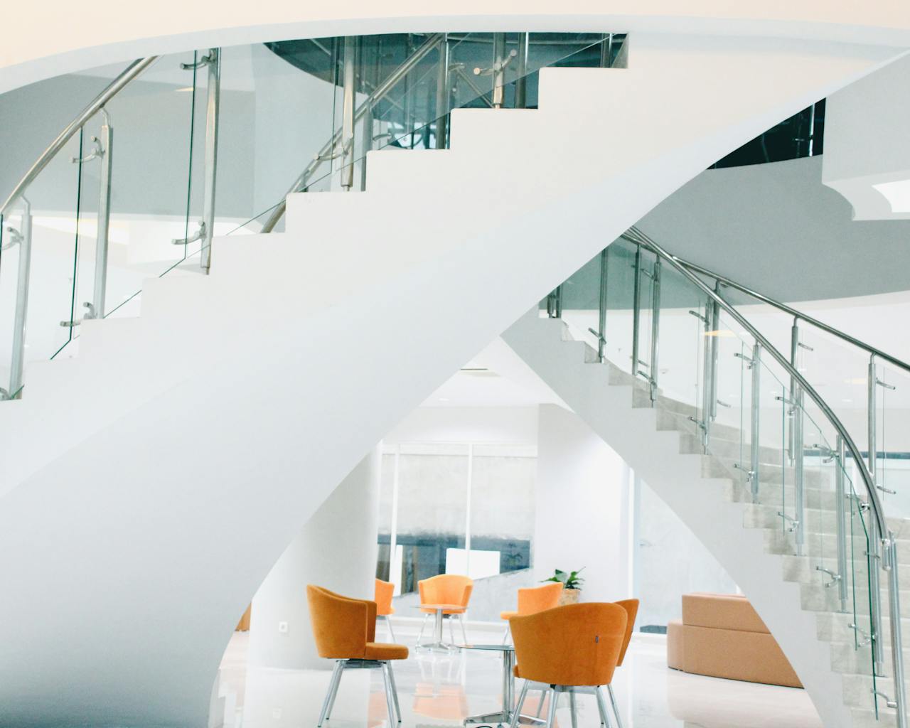 Orange Chairs Near Staircase