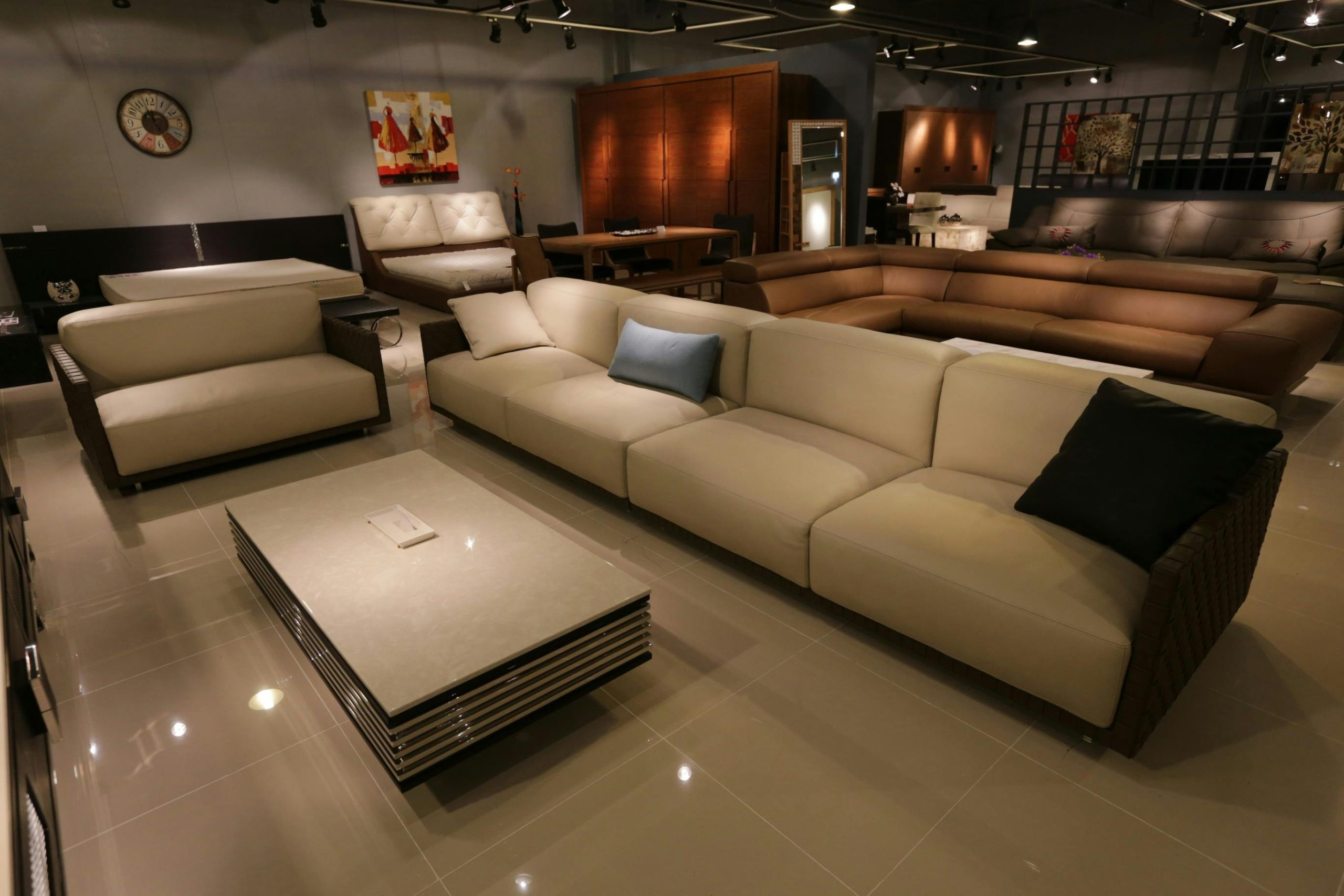 Elegant living room showcasing modern furniture with plush sofas and ambient lighting.